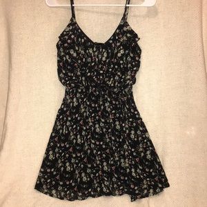 Black dress with red and green flowers.